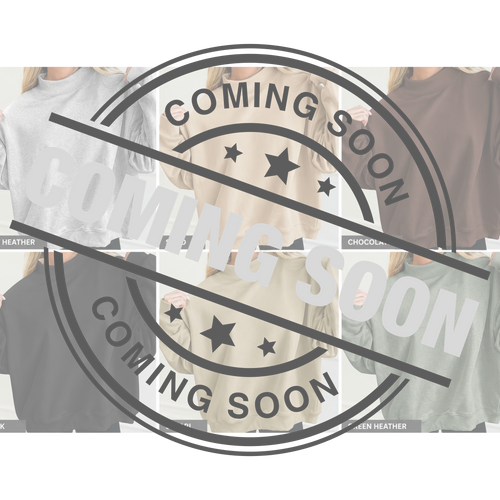 A collage of women wearing different sweatshirts in various colors, overlaid with a large circular 'COMING SOON' stamp and diagonal text. Small color labels at the bottom include heather, chocolate, and green heather.